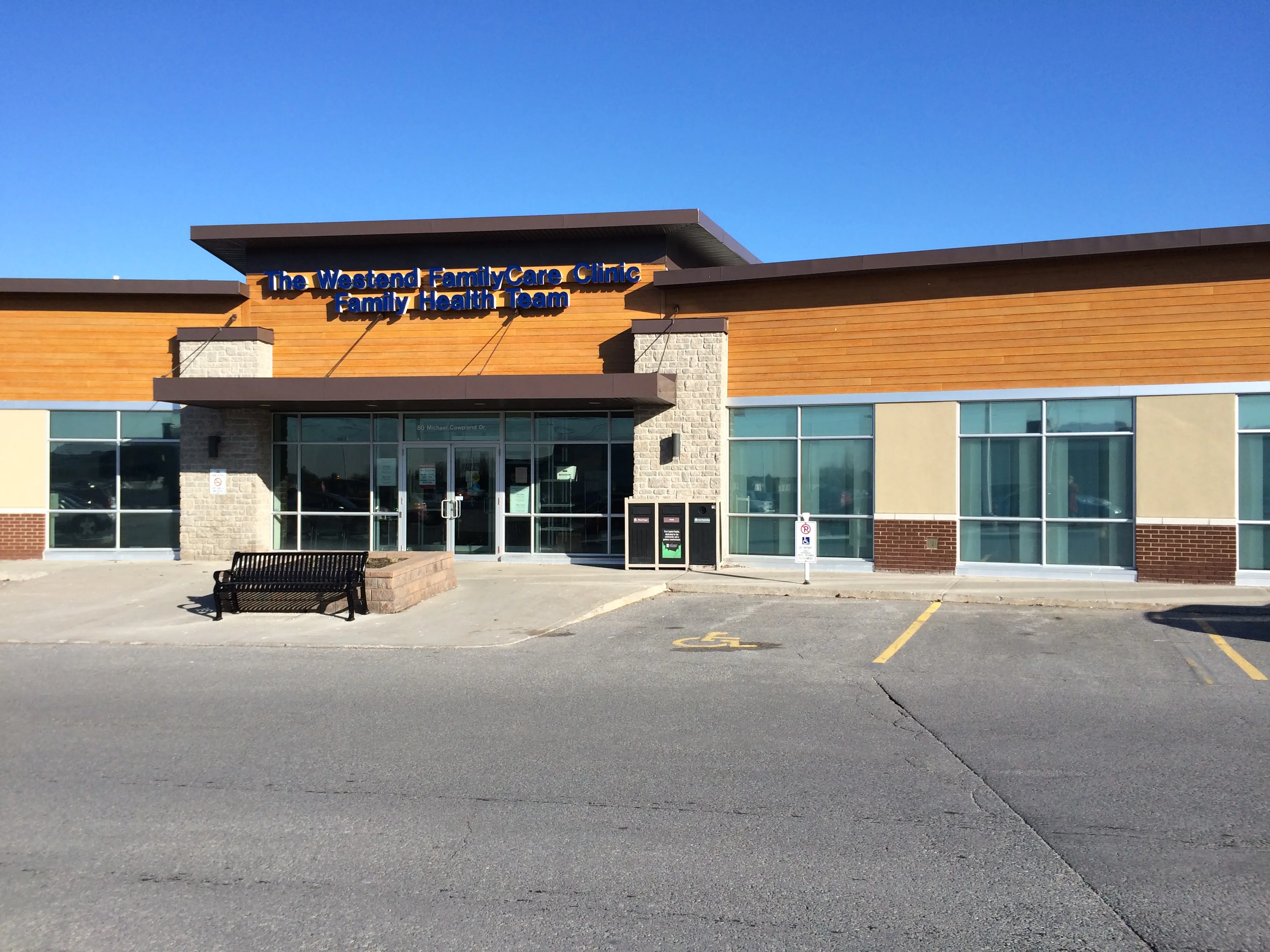 The Westend FamilyCare Clinic building at 80 Michael Cowpland Drive, on a clear day